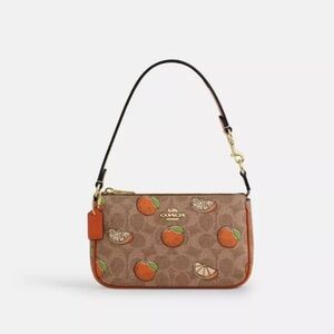 Coach Nolita 19 In Signature Canvas With Orange Print NWT